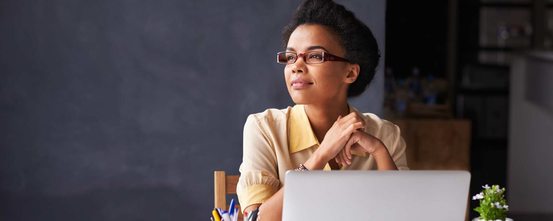 clean-office-laptop-women-wearing-glasses