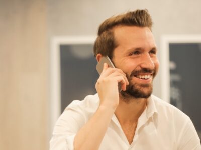 How to prepare for a telephone interview man smiling on phone