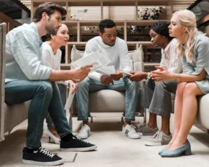 ABL Traditional recruitment, group sitting talking
